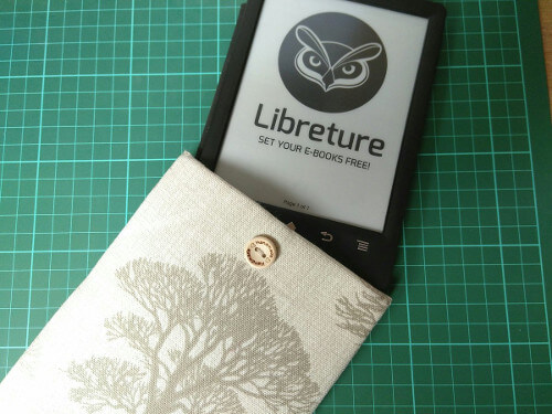 My Reader, showing Libreture logo, partly sitting in my Book Buddle.